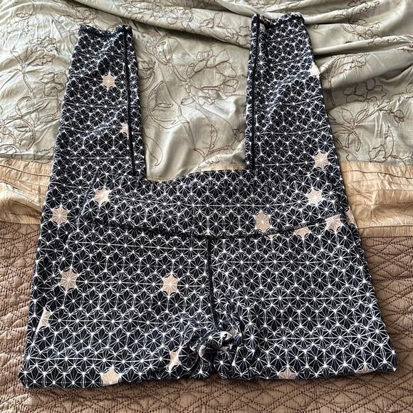 Fabletics | Black and Gold printed leggings Size S - Picture 1 of 9